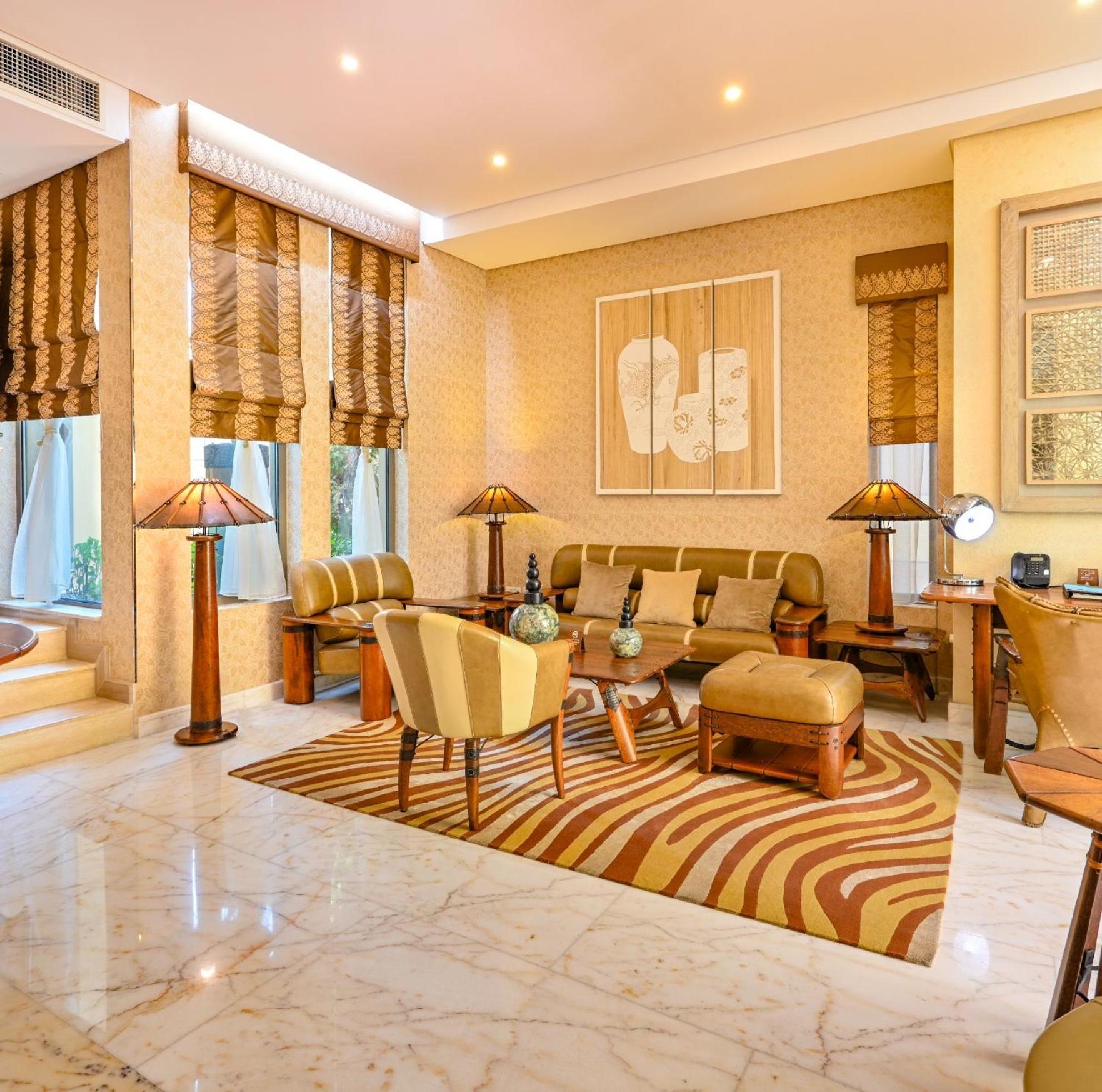 珊瑚度假村 麦纳麦 外观 照片 The interior of a suite at the Taj Mahal Palace, Mumbai