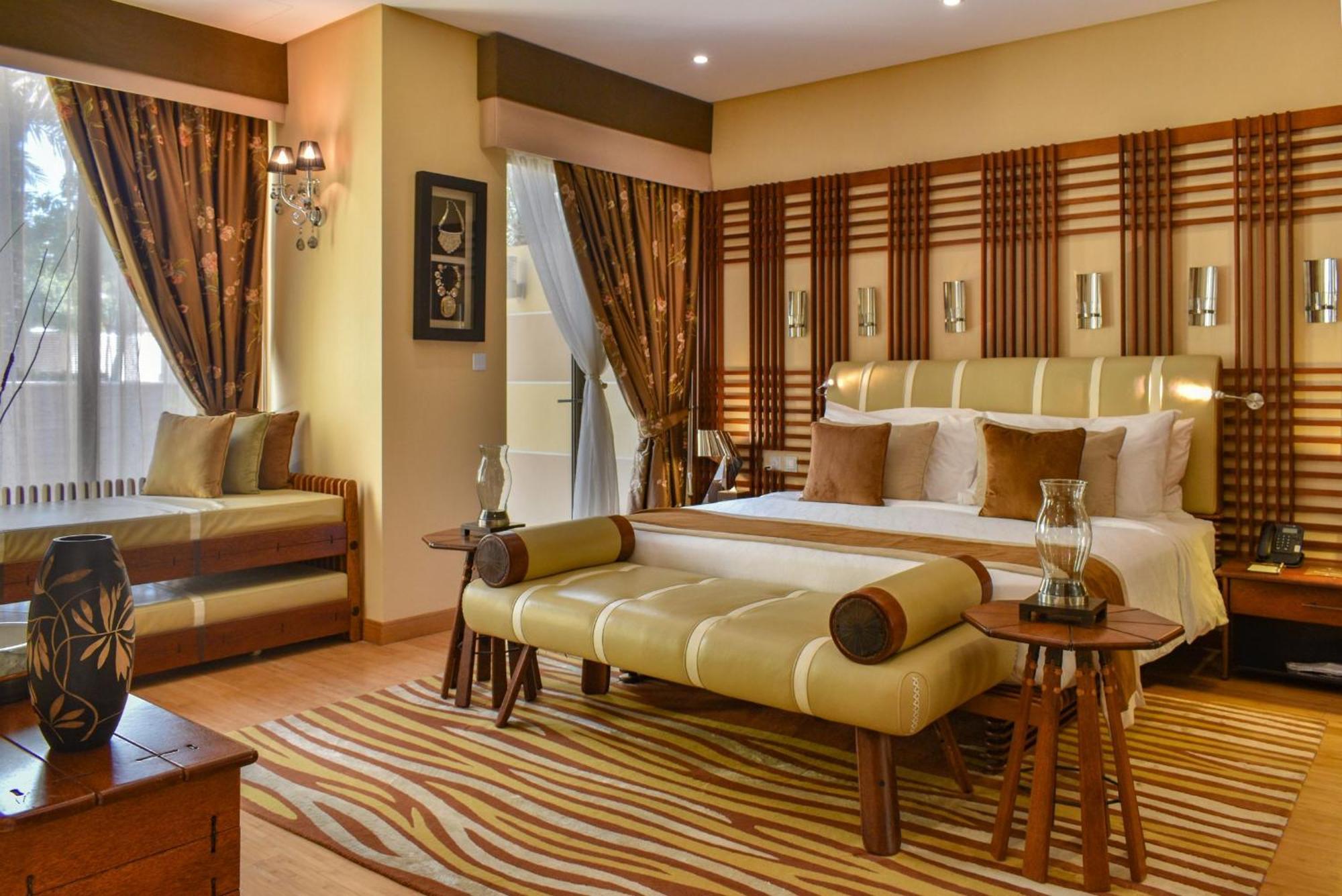 珊瑚度假村 麦纳麦 外观 照片 A bedroom at the Taj Bengal